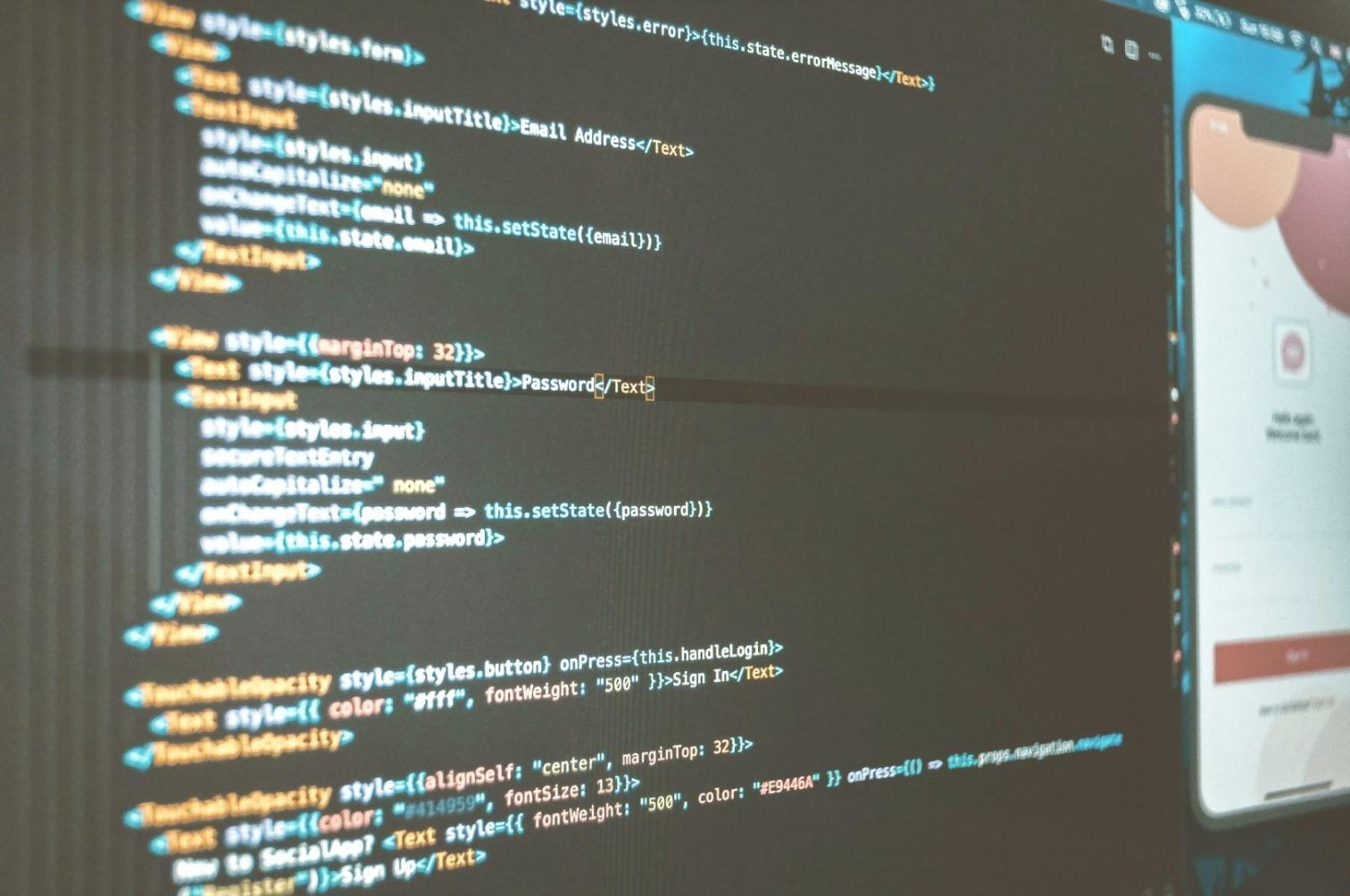 Instructors reviewing student game projects during intensive workshop session